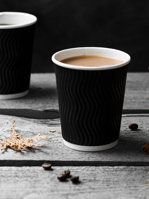arrangement-with-cup-coffee-wooden-background